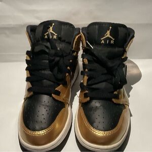 Air Jordan Black and Gold Sneakers